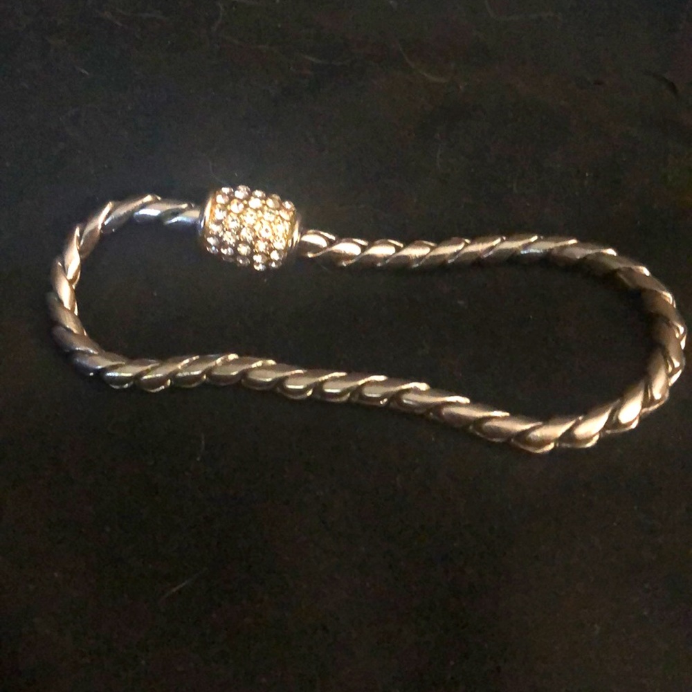 Silver plated, charm bracelet. 7 inches, decorative magnetic clasp